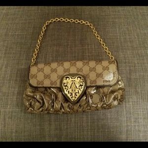 Gucci Monogrammed Beige/Tan Patent Leather Clutch